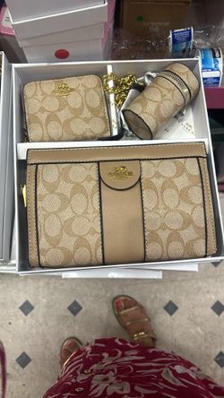 3 piece tan coach with scar
