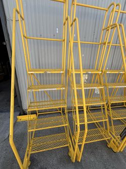 Industrial rolling ladder