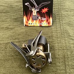 Ultralight backpacking or camping stove, designed for portability and efficiency in outdoor
