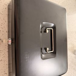 Cash box with key.