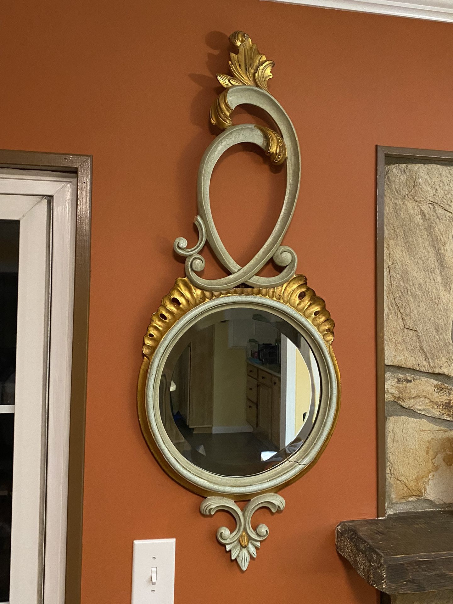 Vintage Harrison & Gil Dauphine Hand Carved Mirror made out of a solid piece of hardwood