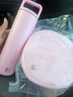 Starbucks tumbler and purse