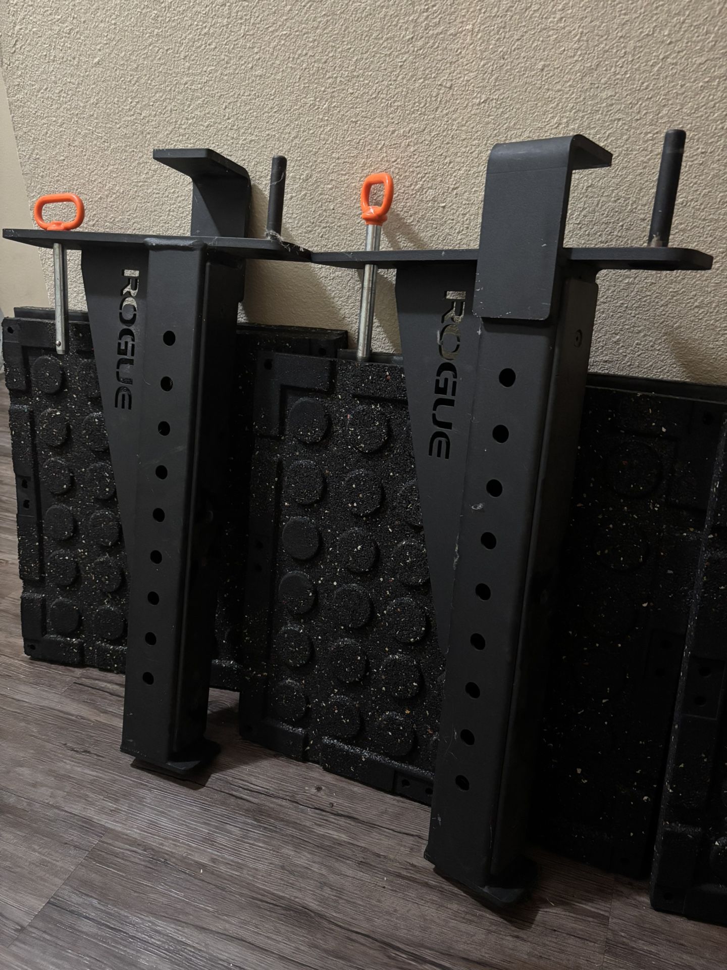 SML-1 Rogue 70” Squat Rack With 2 Storage Pegs For 2” Weights Safety Spotter Arms Included With Pins.  NOTE: J - Hooks Are Not Included Only Spotters