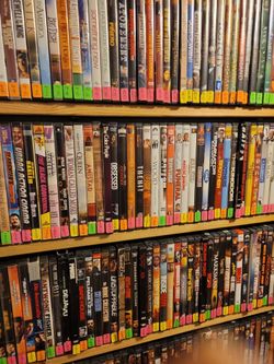 About A Thousand DVDS PLUS About 65 BLUE Ray