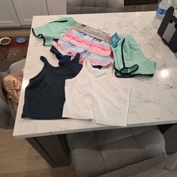 BRAND NEW 4 PAIR OF SHORTS & 2 NEW TOPS SEE DESCRIPTION 