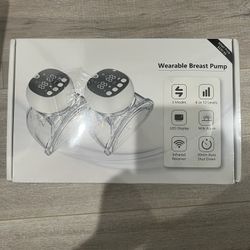Wearable breast pump