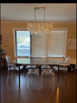 Glass table-extendable (4-6) and ghost chairs
