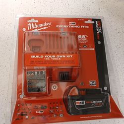 Milwaukee M18 battery and M18 / M12 combo charger - brand new
