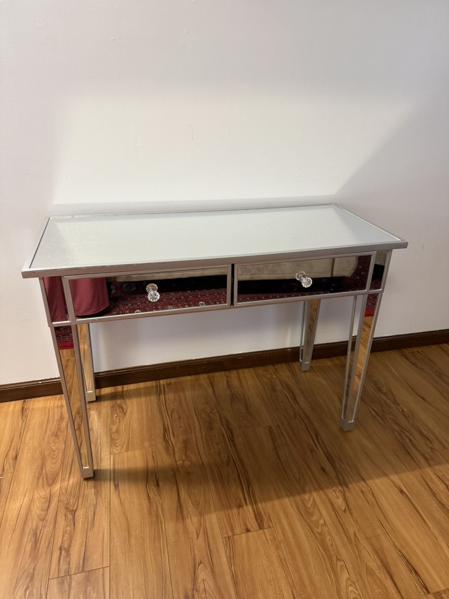 Modern Mirrored Vanity Desk Silver Mirror Finish Makeup Dressing Table with 2 Storage Drawers Deluxe Glass Entryway Console Table Writing Desk for Wom