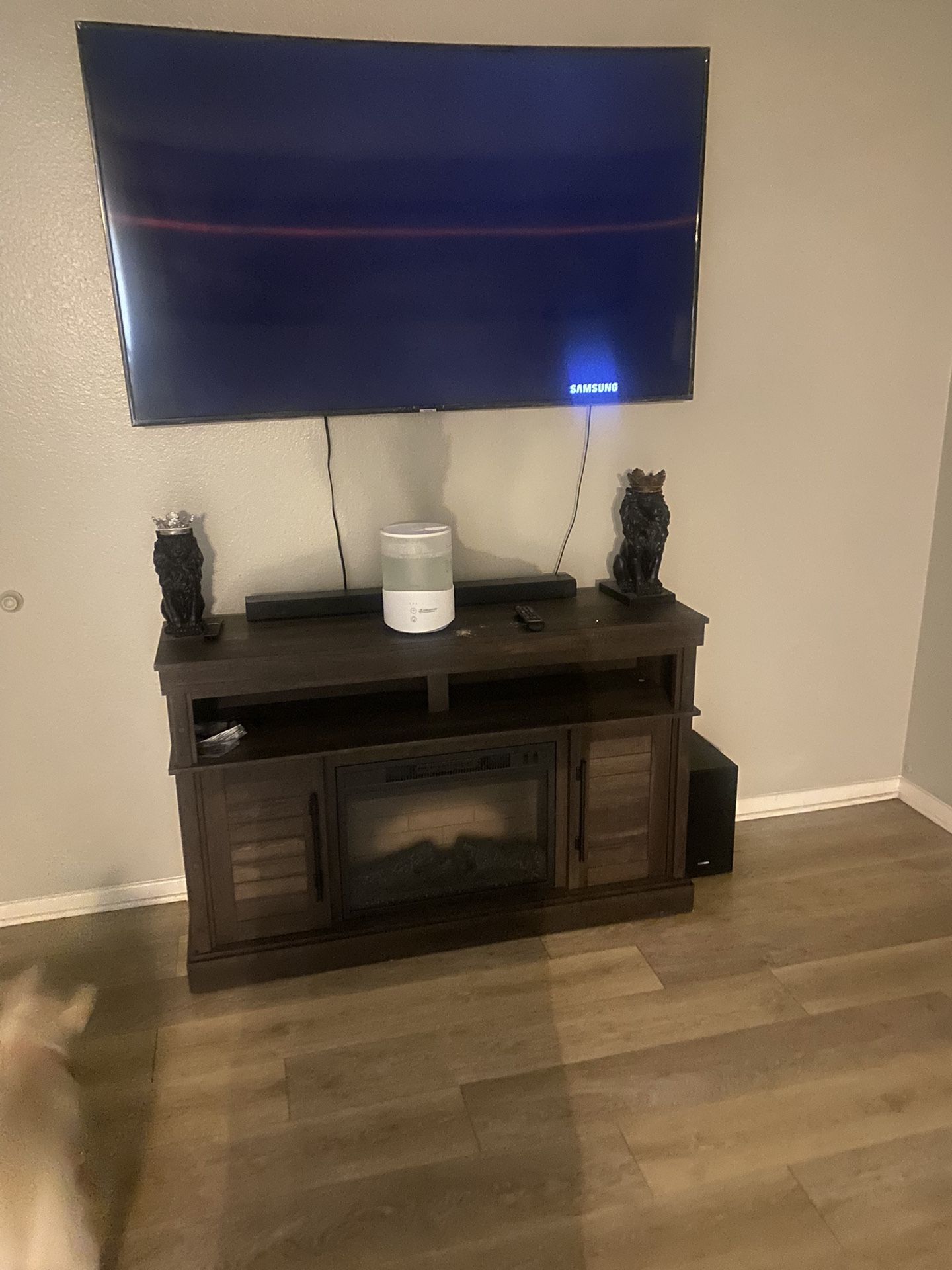 65’ Curve TV And electric Fire Plac