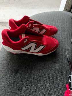 Red new balances cleats