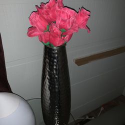 Brushed aluminum vase with faux flowers