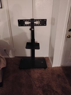 Movable TV Stand On Wheels. 