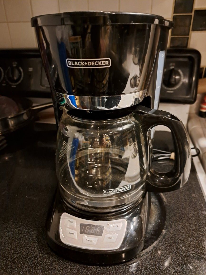 Black +decker 12 cup Quick touch programmable coffee maker...its used but .ive taken really good care of this and i never removed the plastic that cov