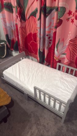 Toddler bed w/ wipeable mattress