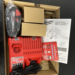New 1.5AH Milwaukee M18 Battery and Charger 