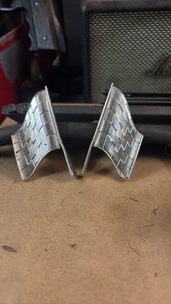 Vintage 1970 ford falcon fender emblems.