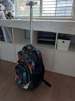 Tilami rolling backpack
