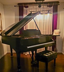 STEINWAY AND SONS  BABY GRAND PIANO
