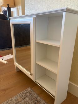 Bathroom vanity mirror and cabinet