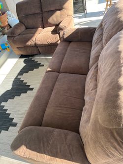 Reclining matching sofas .