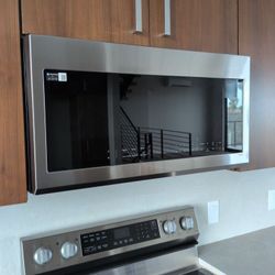 Brand New Samsung Over The Range Microwave Stainless/Wi-Fi
