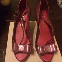 Pink glittery plastic wedges