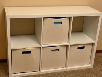 Low profile book shelf with 6 shelves and four soft remj 3 removable drawers drawers.