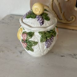 Antique Jar With Fruit On It 