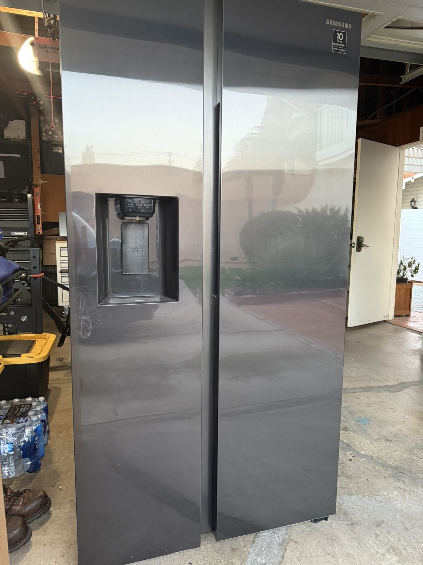 Samsung 27.4 cu. ft. Black Stainless Steel Side-by-Side refrigerator - Like New