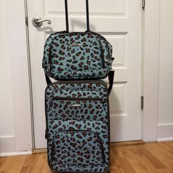 Blue cheetah print suitcase 