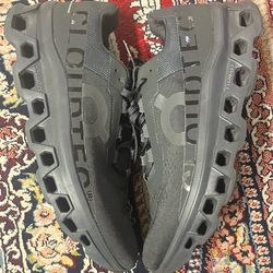 On Cloudmonster in all black size 12
