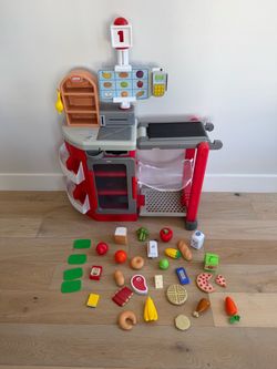 Little tikes shop n learn checkout pretend player