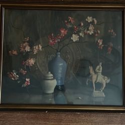 Framed picture of flowers. Frame has some knicks/scratches in it. Rear of pic has a few holes. See pics! Picture and glass are in good condition. 33.5