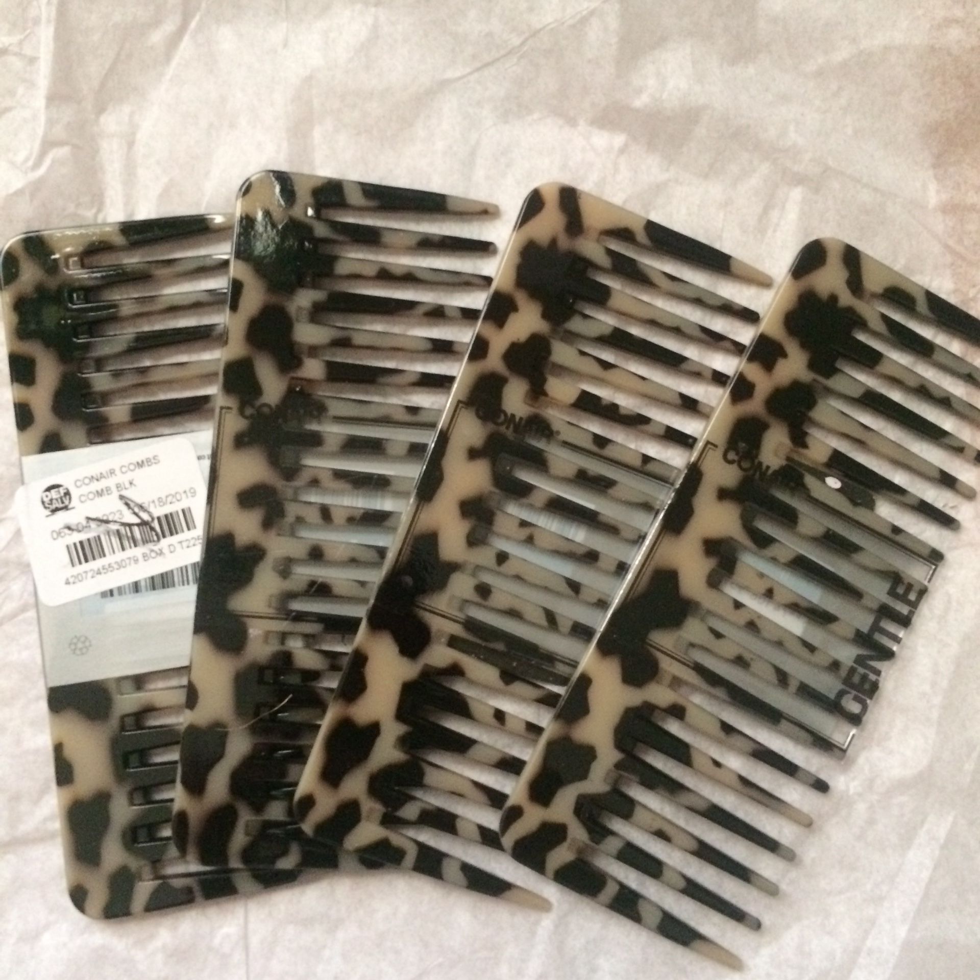 4 Conair Impression Combs