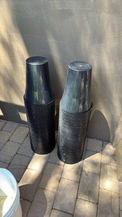 Black plastic buckets
