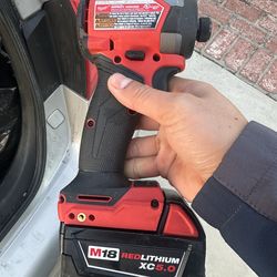 Milwaukee m18 fuel 1/4 hex impact driver with 5.0 battery like new