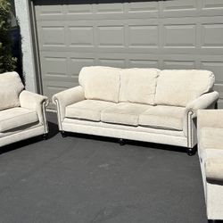 Ashley‘s Furniture Beige Three-Piece Couch Set - Couch, Loveseat, And Chair