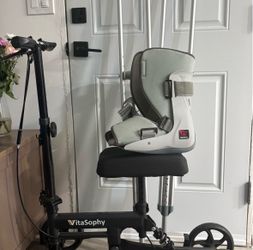 VitaSophy Knee Scooter with Breg Walking Boot, and crutches.