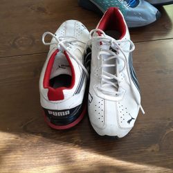 PUMA. RUNNING SHOES $25..00.SIZE 11