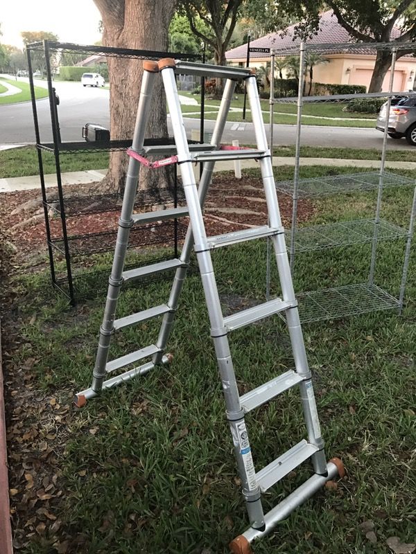 OSHA compliant Telesteps 5' 5" aluminum telescoping step ladder for