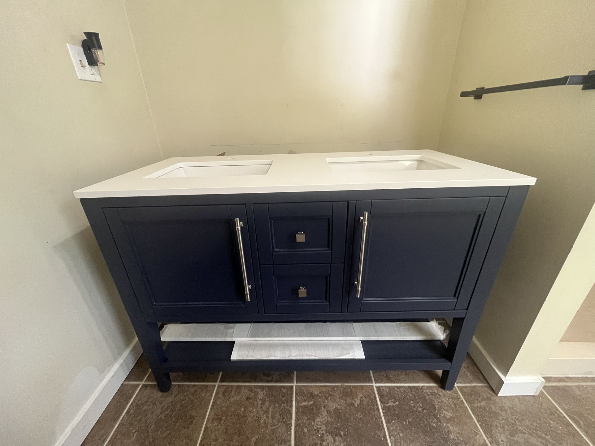 Blue 48 Inch Vanity with double sink and single faucet opening