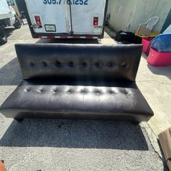 Black Faux Leather Tufted Futon Sofa