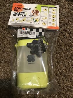 Portable pet water bottle with carrying strap