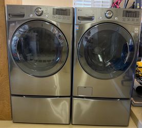 LG Front Load Washer & Electric Dryer Set with Pedestals - Graphite Steel