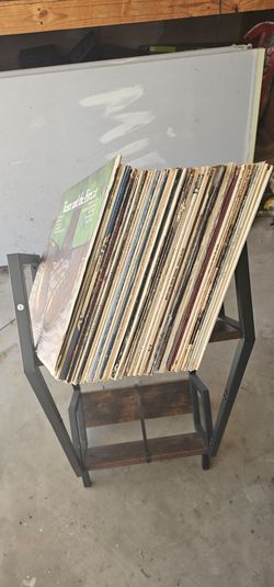 Record rack shelf with vinyl records