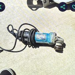 Makita 9533B angle grinder,