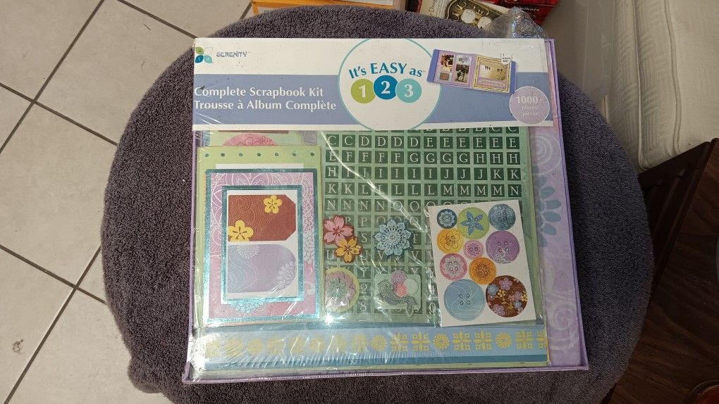 Serenity Complete Scrapbook Kit.
The kit is designed to be easy to use, with a "1-2-3" system.