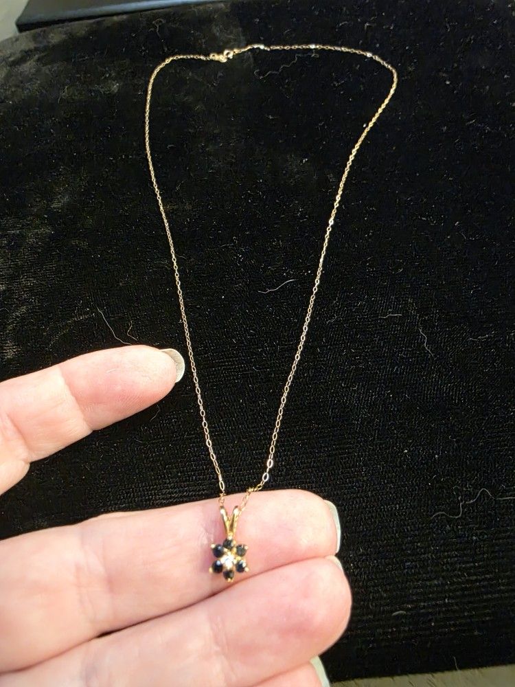 10K yellow gold necklace with 14K yellow gold sapphire pendant