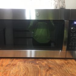 GE Stainless Steel Over The Range Microwave $150